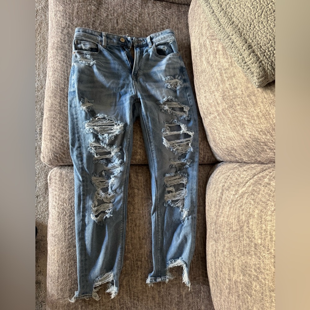 Blue American Eagle ripped jeans.